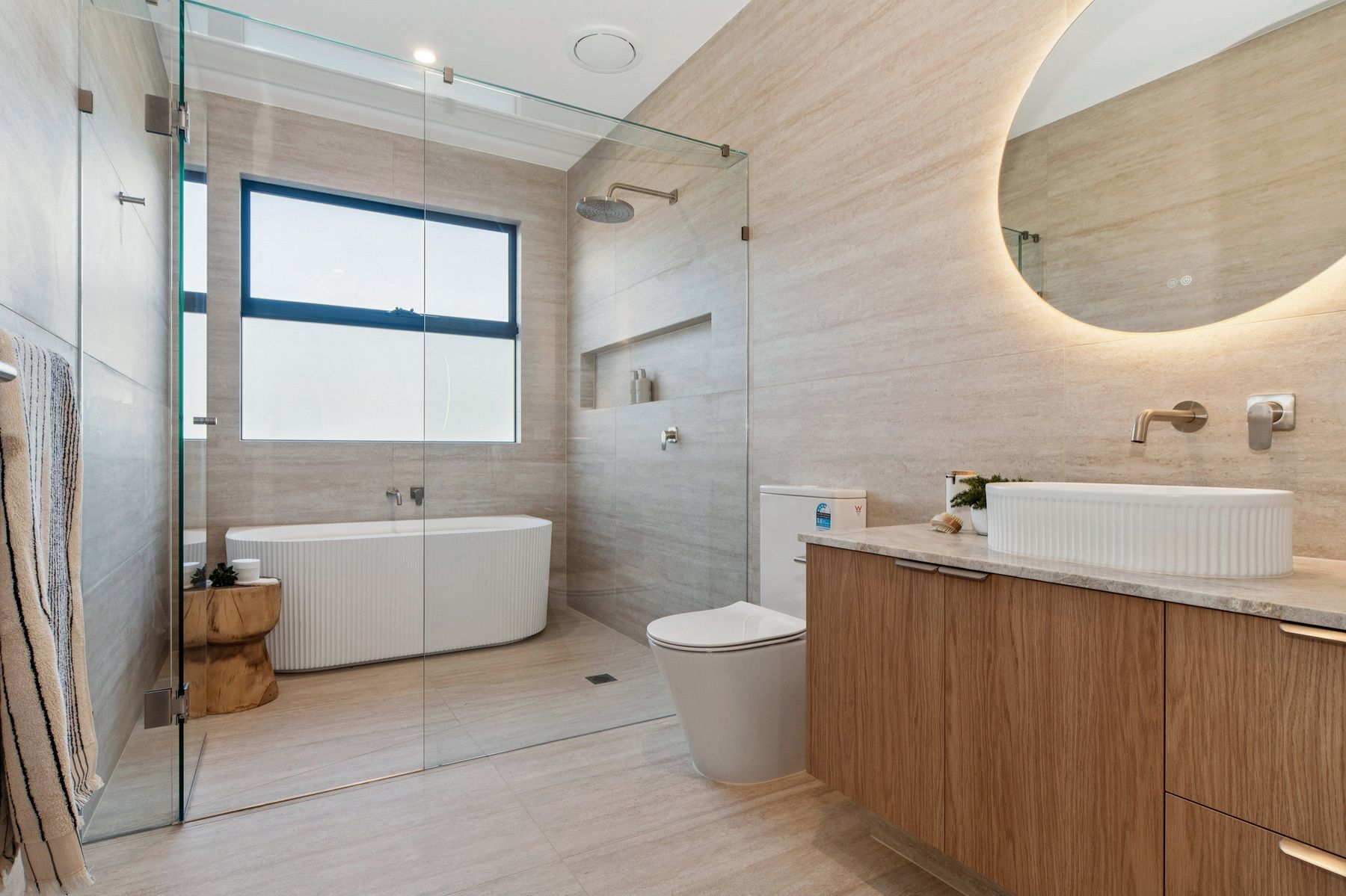 Mt Eliza townhouse bathroom with backlit mirror