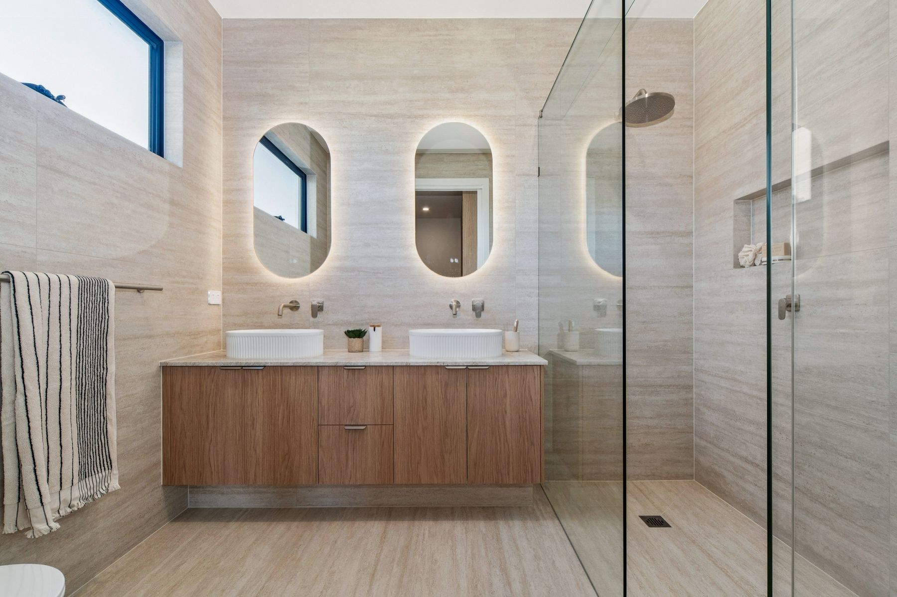 Mt Eliza townhouse ensuite with twin backlit mirrors