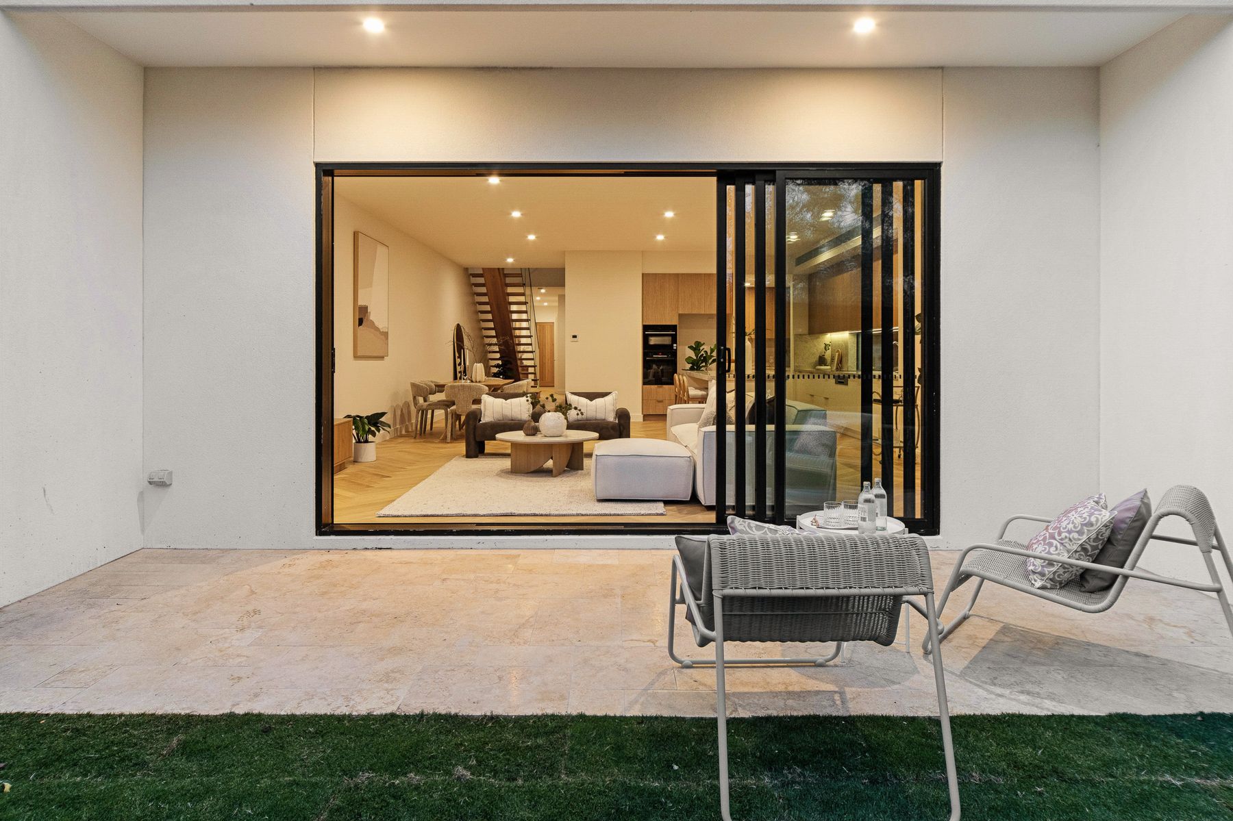 Mt Eliza townhouse alfresco and living area at night